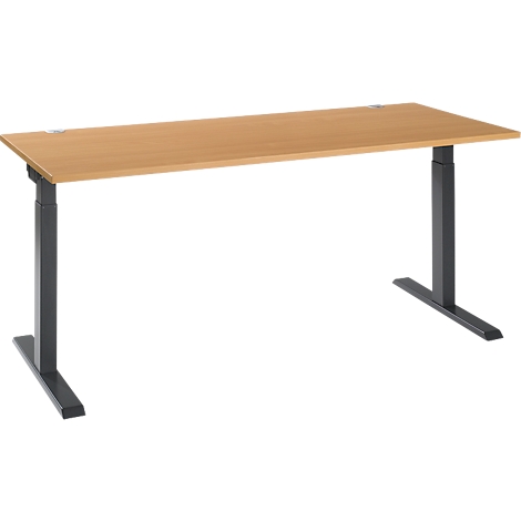 A height-adjustable desk with a light wooden top and gray legs.