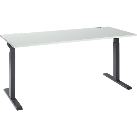 White, height-adjustable desk with black frame. The tabletop is rectangular. Two small holes in the top.