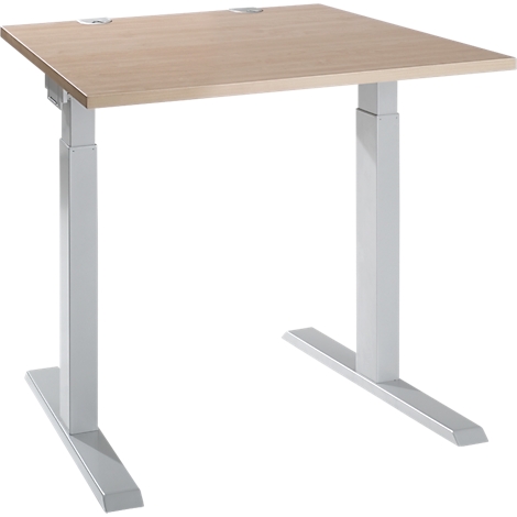 An adjustable height desk with light wood top and silver legs, against a white background.
