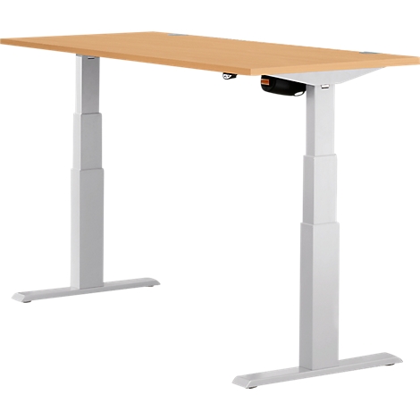 A height-adjustable desk with a light wood top and white legs. A control is attached under the tabletop.