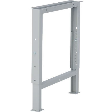 Un marco de metal gris en forma de rectángulo abierto. Tiene una placa base rectangular y un lado ajustable en altura.