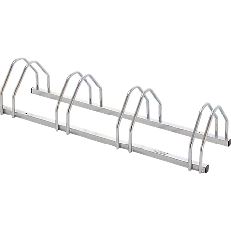 Een zilveren metalen fietsenrek met meerdere houders voor het parkeren van fietsen.