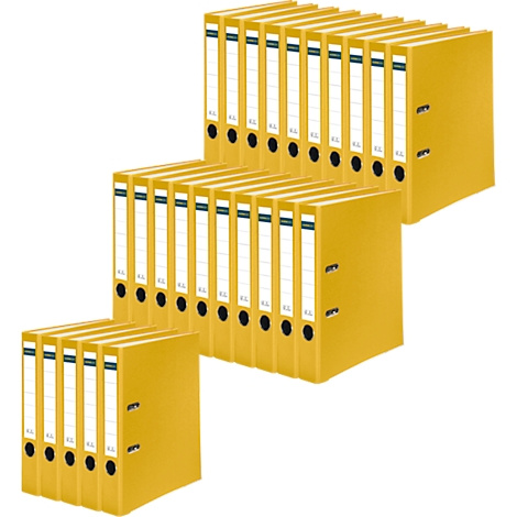 Yellow folders stacked. White labels can be seen on the front.