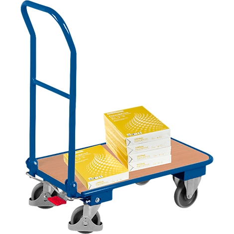 Blue transport cart with stacks of paper. Cart with wooden top and wheels. Paper with a yellow surface is on the top.