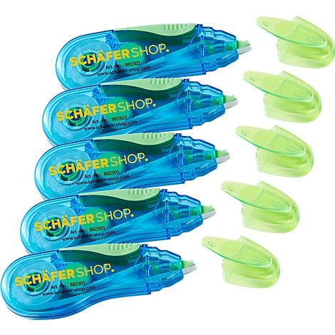 Blue-transparent correction rollers with green lid and yellow lettering SCHÄFER SHOP. Some green caps are lying next to it.
