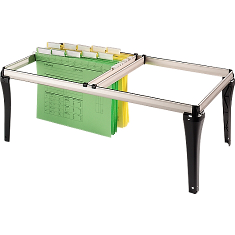 An office hanging file system, made up of a frame with black legs and a silver frame. Green and yellow hanging file folders are stored inside.