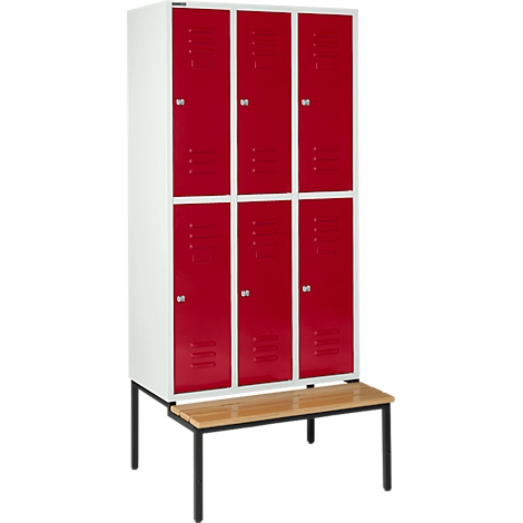 Kast met zes rode deuren, witte kast en bankje.