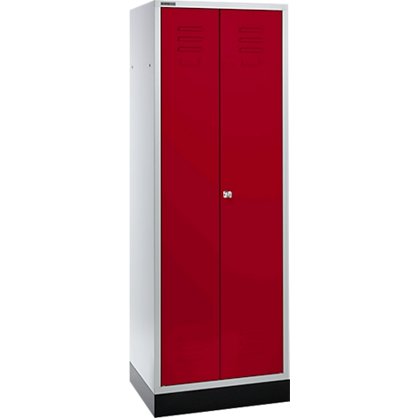 A tall, red steel cabinet with two doors, secured by a silver handle. The sides and frame are white, the base black.