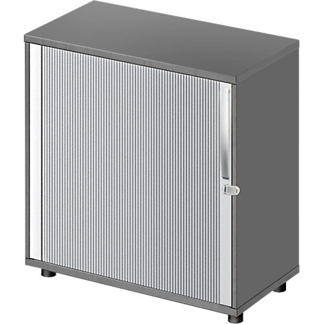 Grey cabinet with a ribbed front door, handle, and feet. The cabinet stands on four small feet.