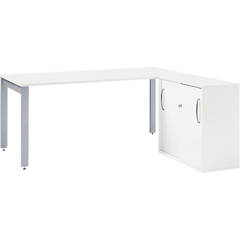 White corner desk with silver legs and cabinet.