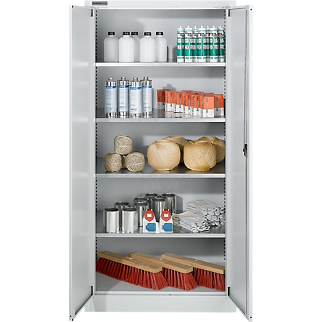 Opened white cabinet with various items: bottles, cans, balls, brushes.