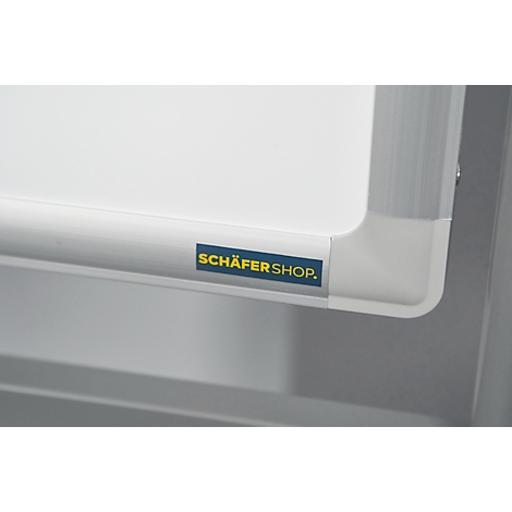 Corner of a white product with the lettering SCHÄFER SHOP on a blue sticker.
