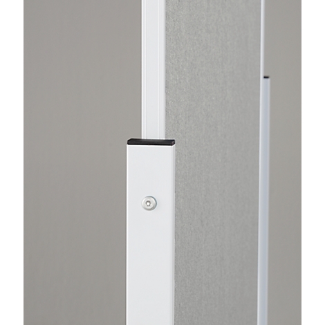 Close-up of a white office partition with gray fabric element and details such as a small, silver screw.