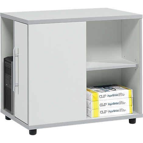 Small white desk with PC compartment, shelf, and stacks of paper. Gray trim and black feet.