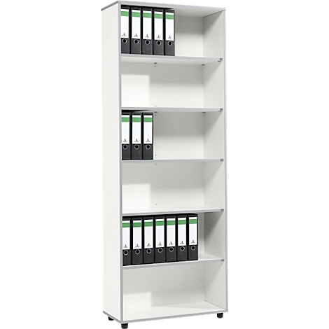White bookcase with binders. The bookcase has 6 compartments and stands on black feet.