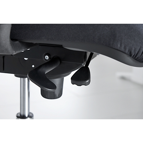 Detail view of the lower part of an office chair. The chair is black with an adjustable lever mechanism.