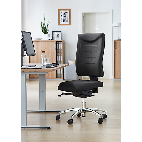 Black office chair in a modern office setting, with a desk, cabinets, and a plant in the background.