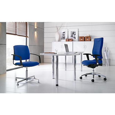 Office with two blue office chairs by a round table. In the background windows and cabinet.