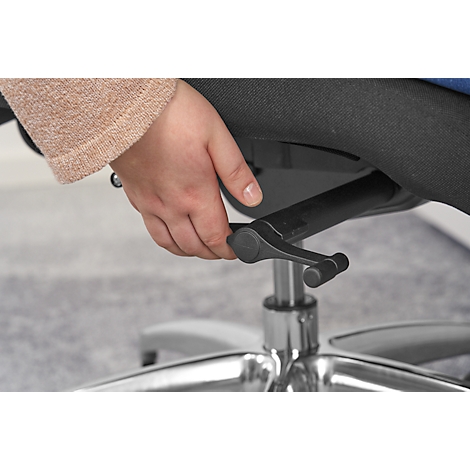 A hand operates a black lever on an office chair. The chair has silver legs.