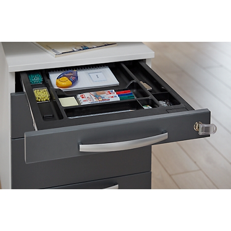 Gray filing cabinet with open drawer, filled with office supplies. Silver handle and lock.