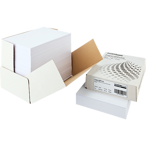 Papierstapel in einer offenen weißen Box und einer separaten Box mit dem Aufdruck 'Paper@Print'.