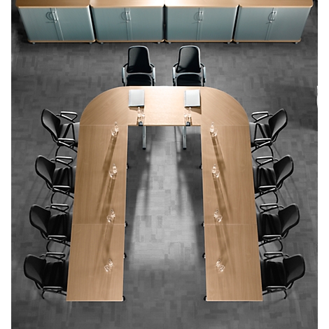 Conference table with chairs from a bird's eye view. Cabinets in the background.