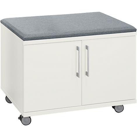 White cabinet with grey cushion, two doors, handles and castors.
