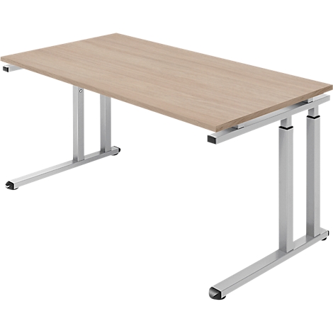 Hellbrauner Schreibtisch mit Metallbeinen, freigestellt vor weißem Hintergrund.