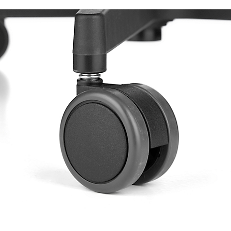 Close-up van een zwart stoelwiel. Het bestaat uit twee wielen die aan de basis met metaal zijn verbonden.