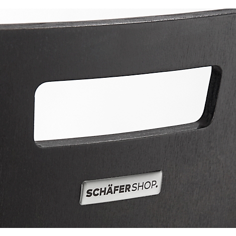 Close-up of a black wooden backrest with a rectangular handhold and the lettering SCHÄFERSHOP on a sign.