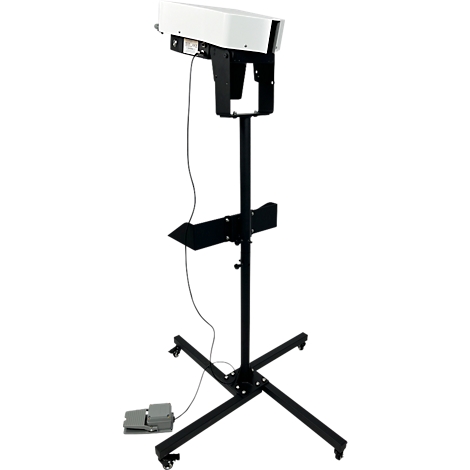 Machine à souder les feuilles industrielles, blanche et noire, sur un support noir avec une pédale et des roulettes.