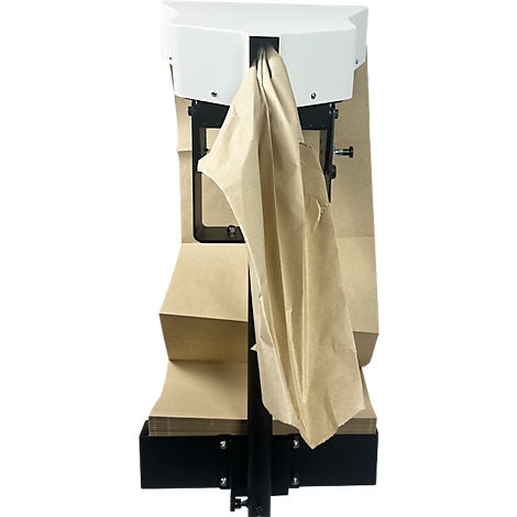 Un appareil avec des sacs en papier. Un sac en papier brun est tiré d'une ouverture de l'appareil.