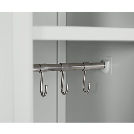 Hanging rail with three metal hooks attached to the wall.