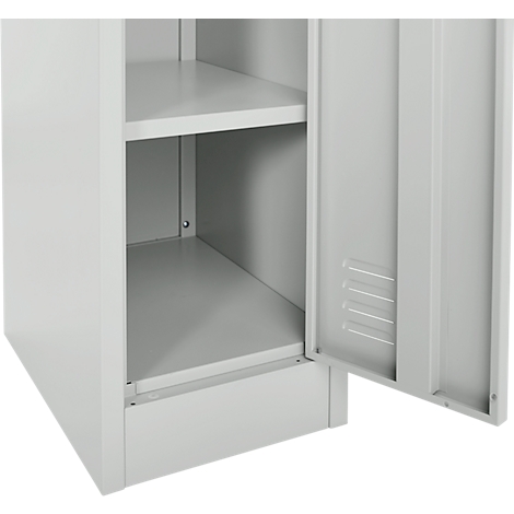 Grey steel cabinet with open door, view of two shelves. The door has ventilation slots.