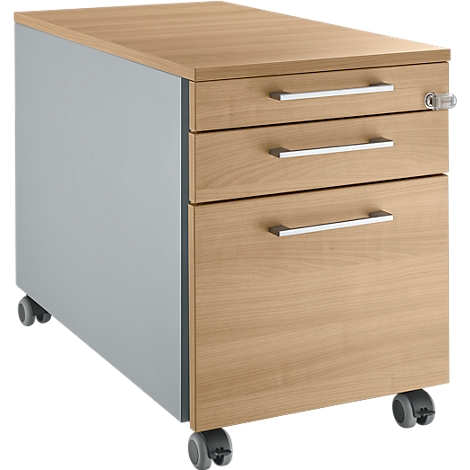 Light brown rectangular mobile pedestal with three drawers and silver handles. It stands on grey castors.