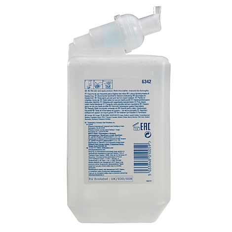 Flacon de savon transparent avec distributeur à pompe attaché. Des informations sur le produit et un code-barres sont affichés au dos.