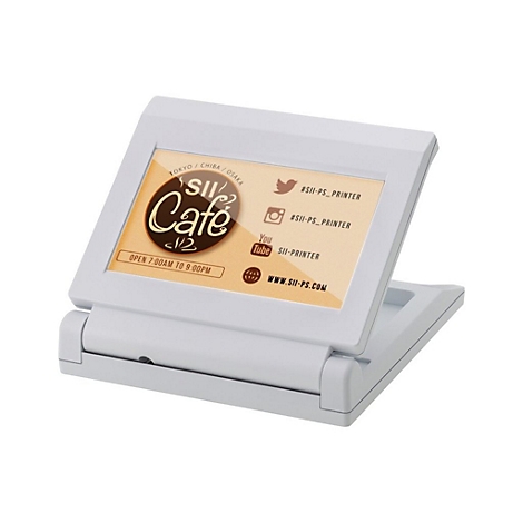 Imprimante blanche avec le logo SII Cafe sur l'écran. Les heures d'ouverture et les icônes des médias sociaux sont également visibles.