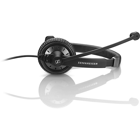 Black Sennheiser headset with microphone lying against a white background. The headset is reflecting.