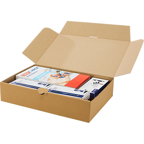 Offener brauner Karton mit mehreren Produktverpackungen und Schreibwaren im Inneren.