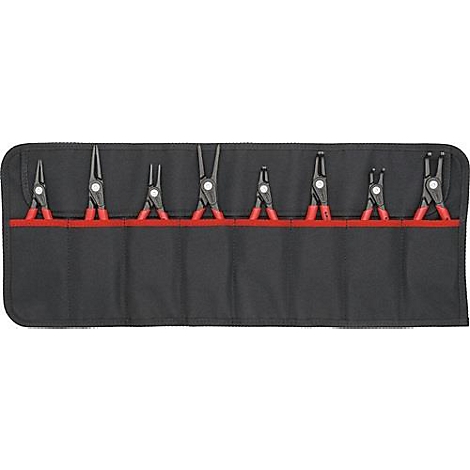 Zwarte gereedschapsrol met rood-zwarte tangen.