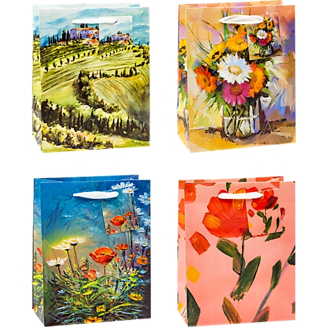 Quatre sacs cadeaux avec différents motifs floraux et paysagers : bouquet de fleurs, coquelicots, paysage italien.