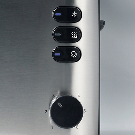 Close-up of a toaster with a stainless steel look. Control buttons: defrost, reheat, browning degree rotary knob.