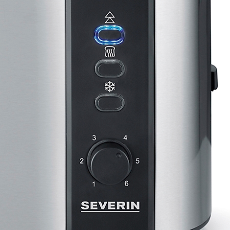 Detail of a toaster control panel with knob. The blue light is on.