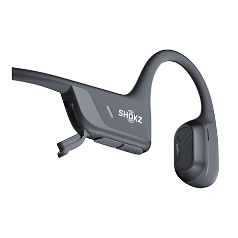 Grauer Shokz-Kopfhörer, Detailaufnahme. Aufschrift 'Shokz'.