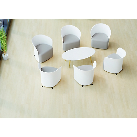 White and gray seating group with a table in a bird's eye view. On light wood flooring.