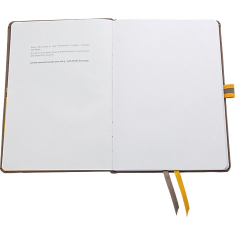 Open notebook with blank pages, text on one page. Two colored bookmarks.
