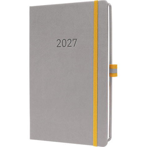 Graues Notizbuch mit dem Schriftzug „2027“ und gelbem Gummiband.