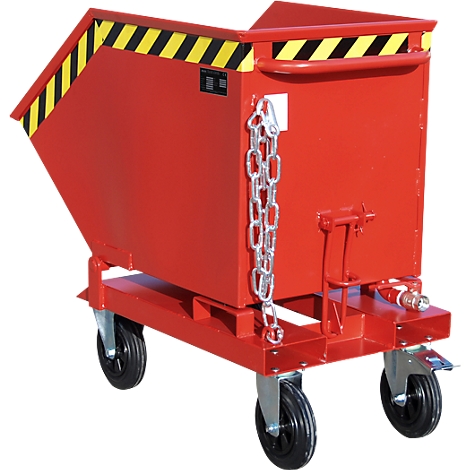 Red container on wheels with yellow and black warning markings. Chain and wheels are visible.