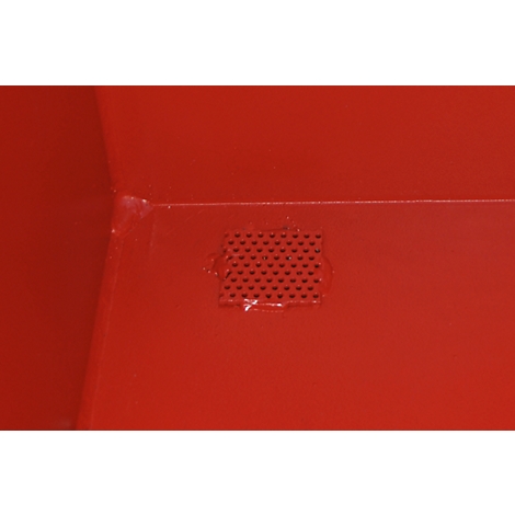 Red detail. Rectangle with many small holes.