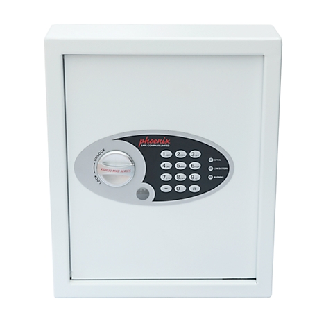 Witte kluis met numeriek toetsenbord, draaiknop en Phoenix-logo. "PRESS AND SHIFT" staat op de knop.